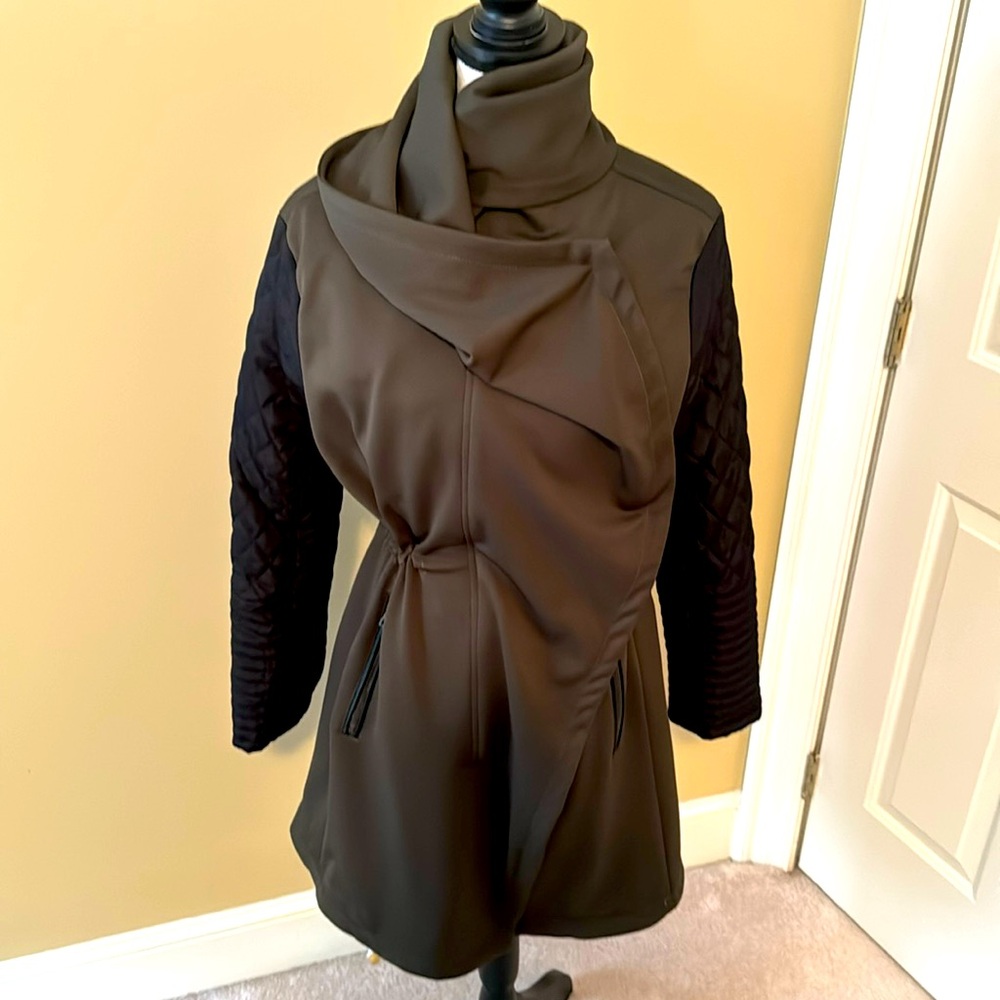 Vince Camuto coat in army green with black quilted sleeves. Size M.